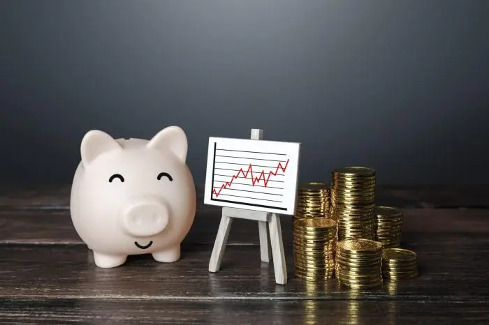 pig piggy bank and positive growth graph