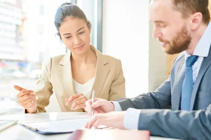 successful young businesswoman meeting client