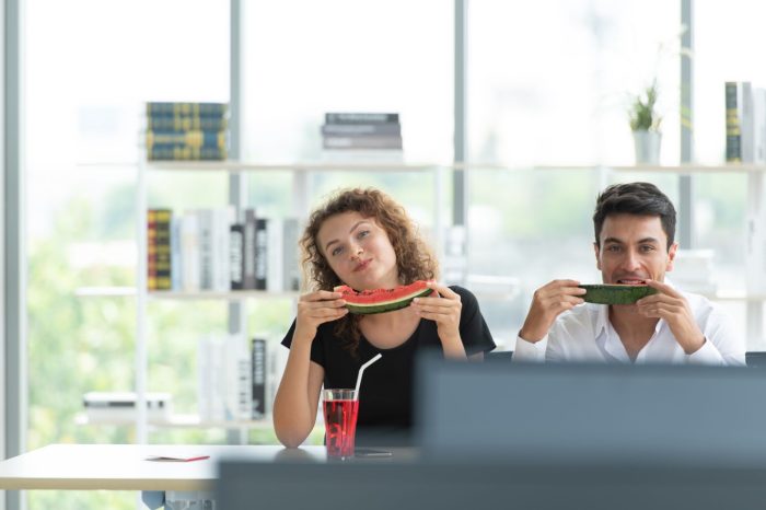 two office workers travel